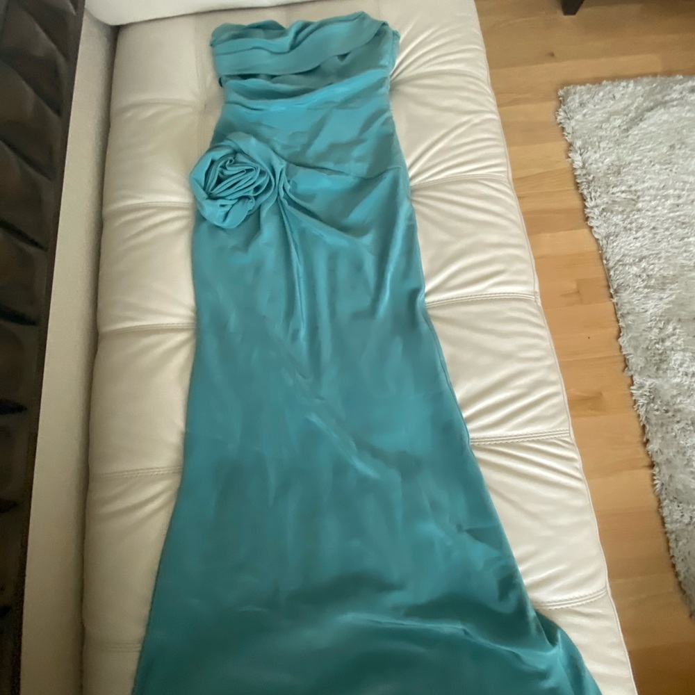 Teal green gown in great condition.